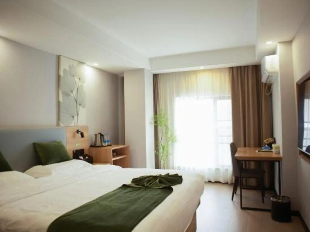 Bed in GreenTree Inn Express Hainan Haikou Haixiu Zhong Road