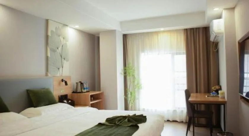 Bed in GreenTree Inn Express Hainan Haikou Haixiu Zhong Road