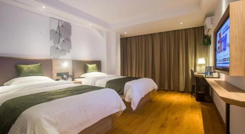 Bed in GreenTree Inn Express Hainan Haikou Haixiu Zhong Road