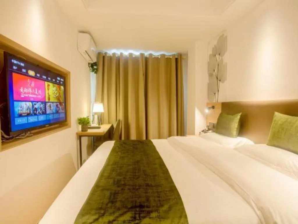 Bed in GreenTree Inn Express Hainan Haikou Haixiu Zhong Road