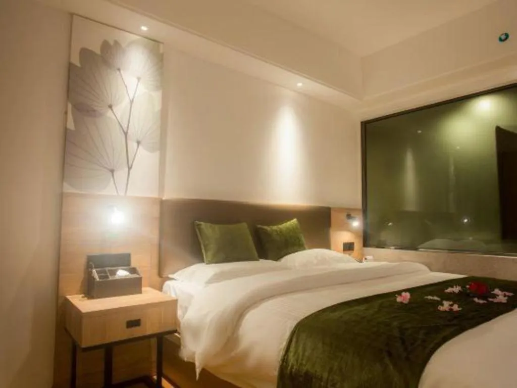 Bed in GreenTree Inn Express Hainan Haikou Haixiu Zhong Road