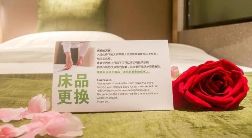 Bed in GreenTree Inn Express Hainan Haikou Haixiu Zhong Road