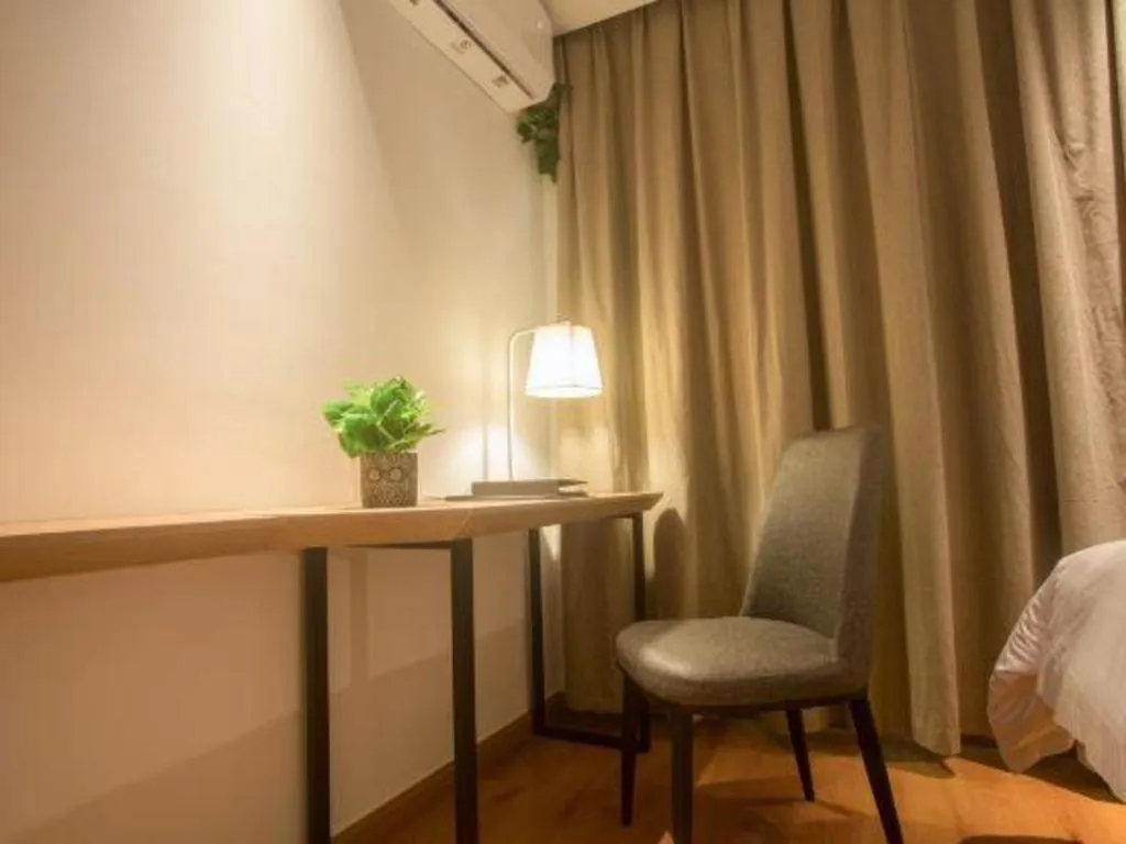 Bed in GreenTree Inn Express Hainan Haikou Haixiu Zhong Road