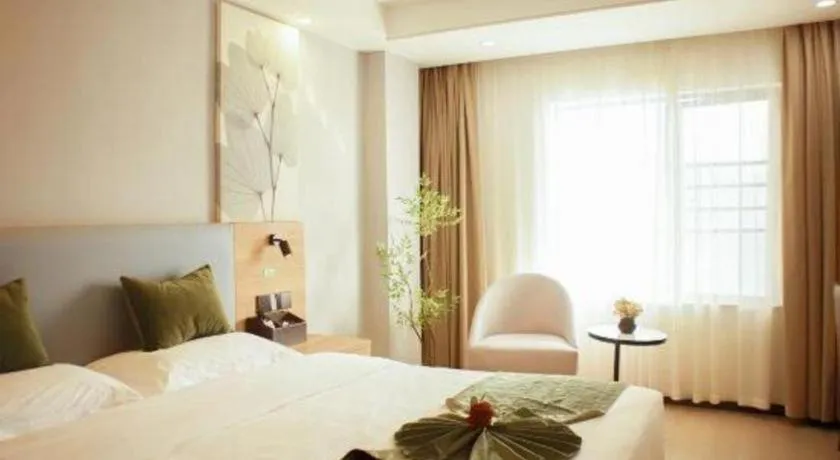Bed in GreenTree Inn Express Hainan Haikou Haixiu Zhong Road