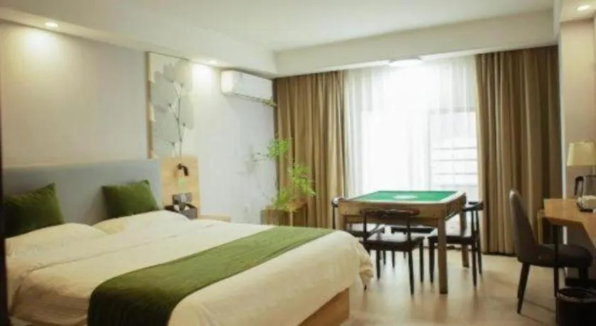 Bed in GreenTree Inn Express Hainan Haikou Haixiu Zhong Road