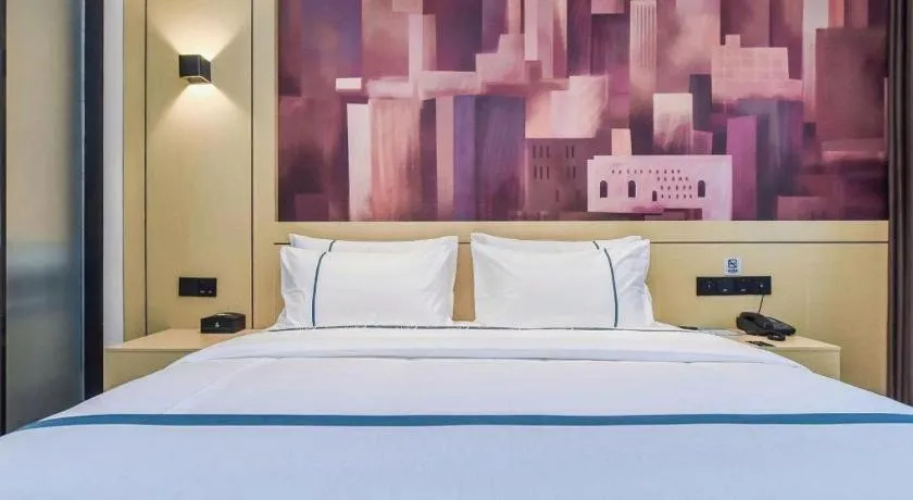 Bed in City Comfort Inn Chongqing Pengshui Yujing Jiangshan