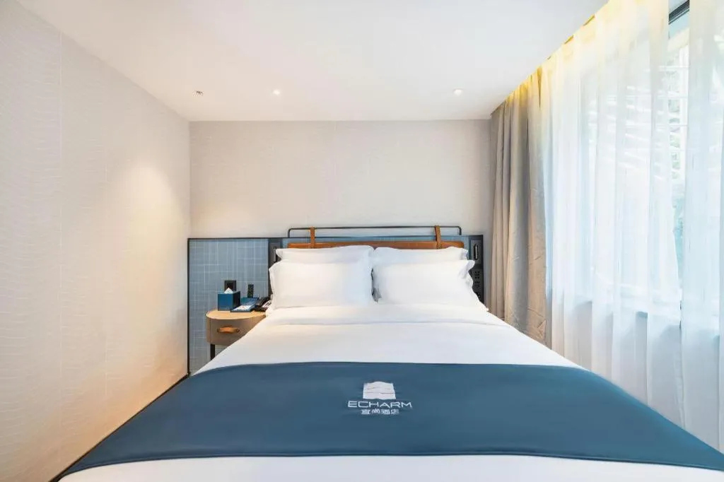 Bed in Echarm Hotel Guangzhou Tiyu West Raod Metro Station