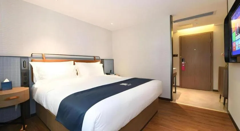 Bed in Echarm Hotel Guangzhou Tiyu West Raod Metro Station