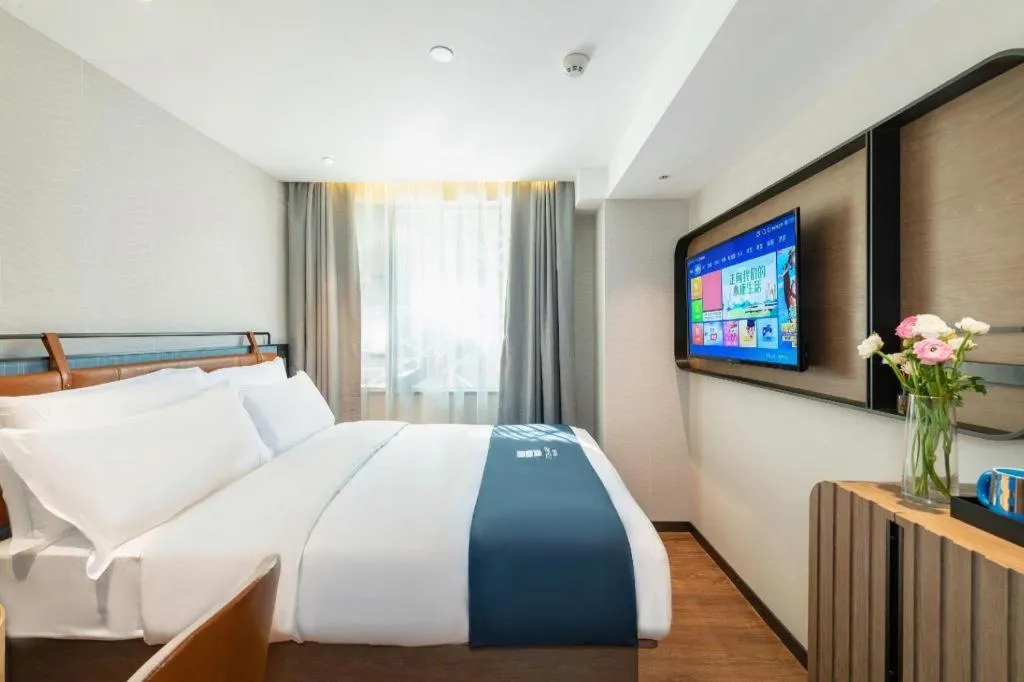 Bed in Echarm Hotel Guangzhou Tiyu West Raod Metro Station