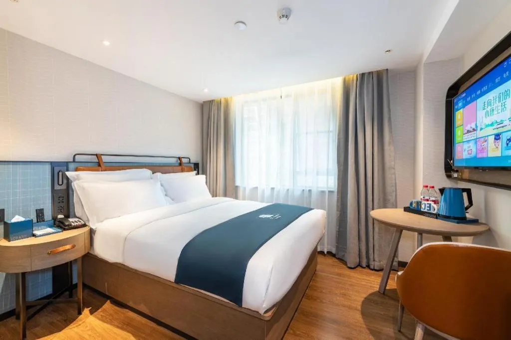 Bed in Echarm Hotel Guangzhou Tiyu West Raod Metro Station