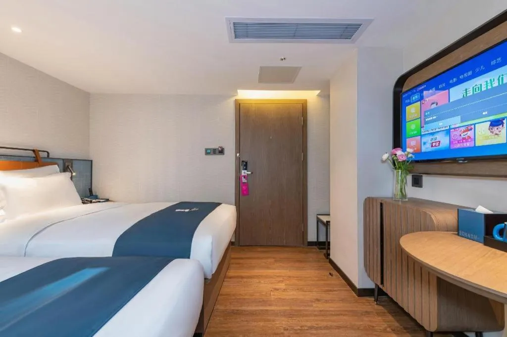 Bed in Echarm Hotel Guangzhou Tiyu West Raod Metro Station
