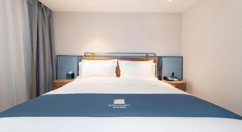 Bed in Echarm Hotel Guangzhou Tiyu West Raod Metro Station