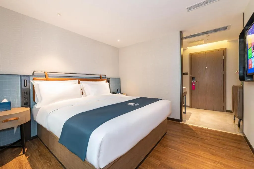 Bed in Echarm Hotel Guangzhou Tiyu West Raod Metro Station