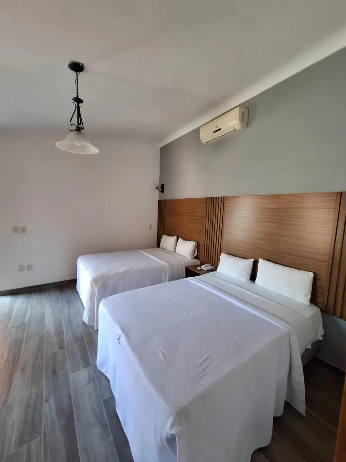 Bed in Hotel Aquiles