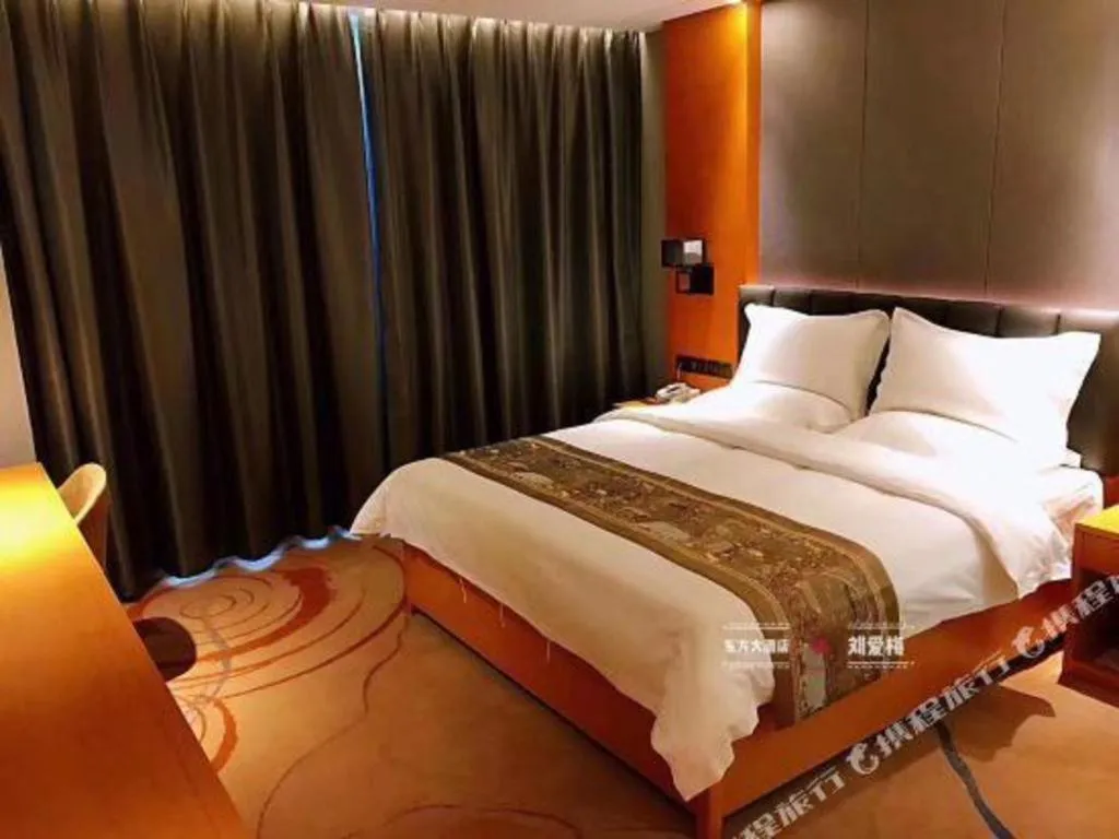 Bed in Borrman Hotel Jinan Yijia Exhibition Center Laotun Metro Station