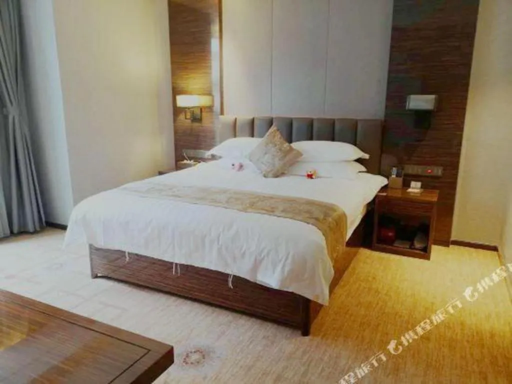 Bed in Borrman Hotel Jinan Yijia Exhibition Center Laotun Metro Station