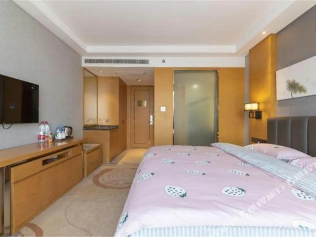 Bed in Borrman Hotel Jinan Yijia Exhibition Center Laotun Metro Station