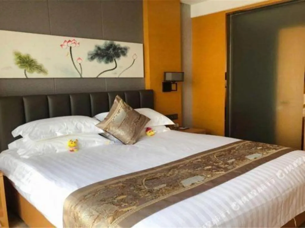 Bed in Borrman Hotel Jinan Yijia Exhibition Center Laotun Metro Station