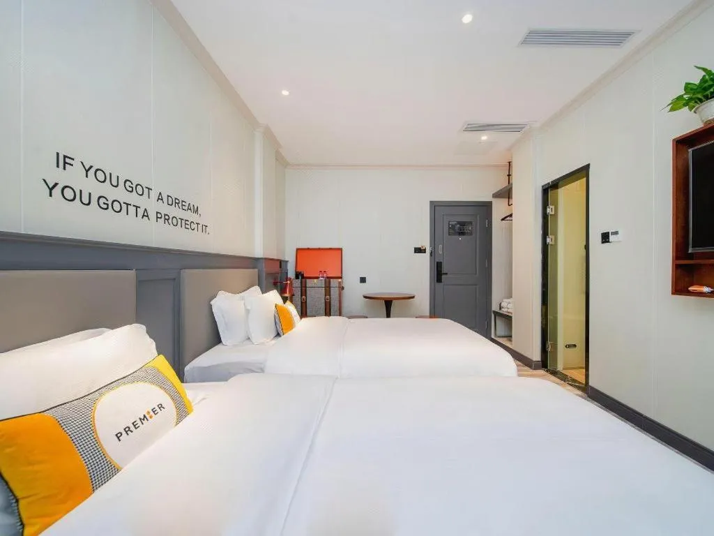 Bed in City Comfort Premier Hotel Guangzhou Tower Chigang Metro Station Pazhou Exhibition