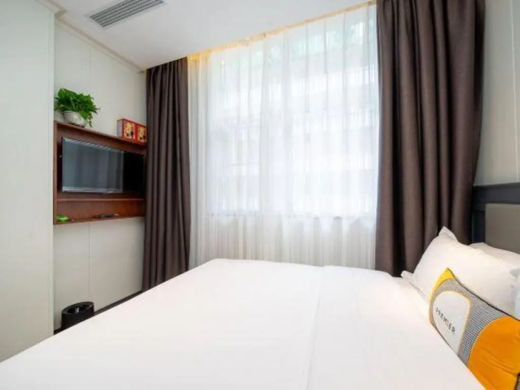 Bed in City Comfort Premier Hotel Guangzhou Tower Chigang Metro Station Pazhou Exhibition