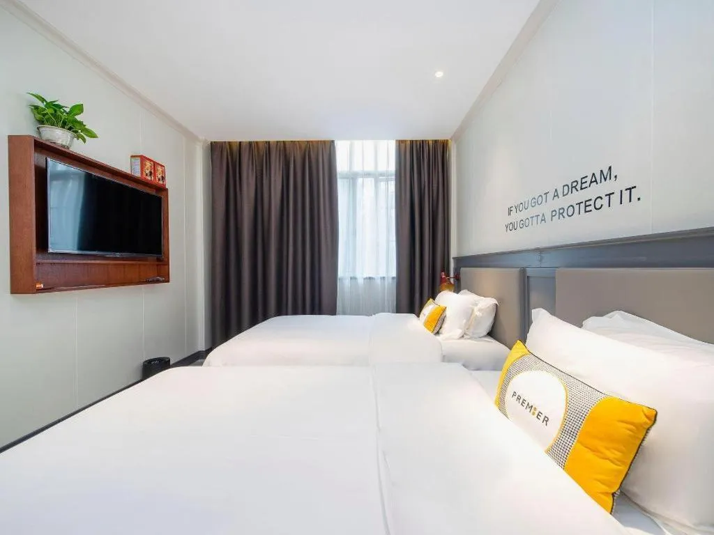 Bed in City Comfort Premier Hotel Guangzhou Tower Chigang Metro Station Pazhou Exhibition