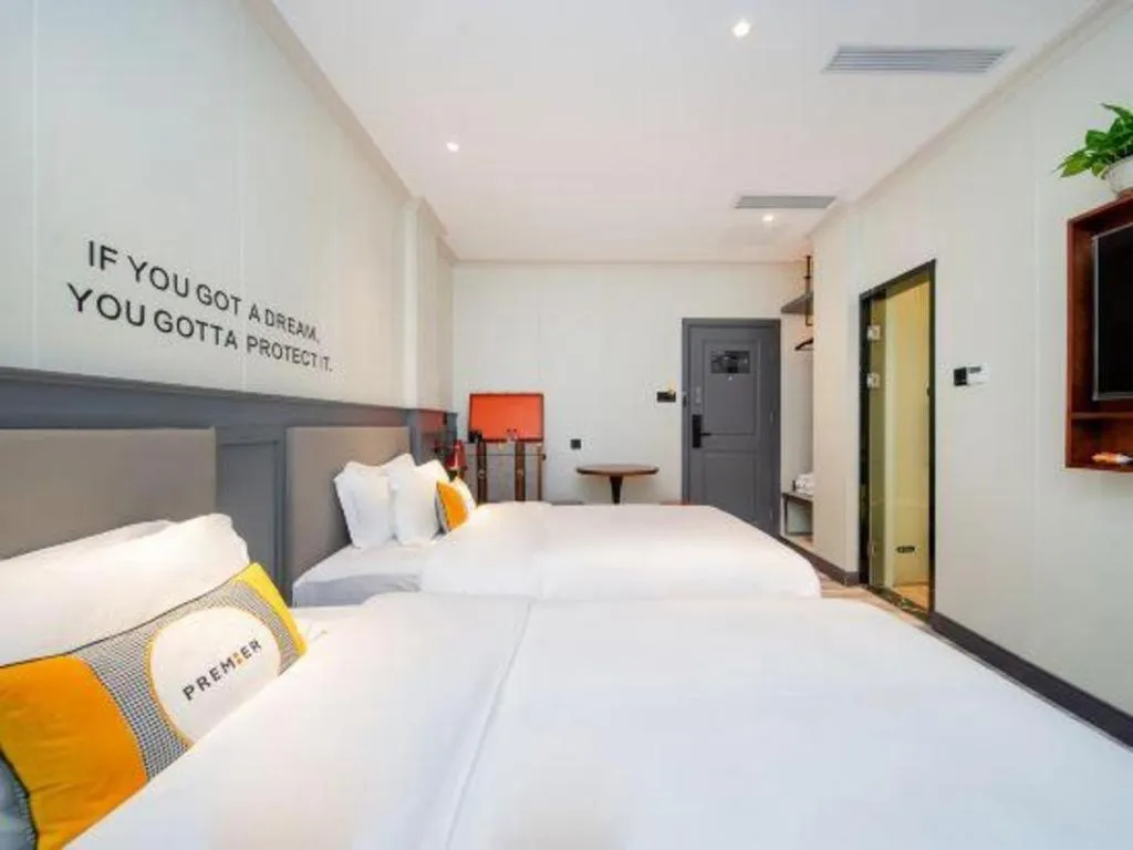 Bed in City Comfort Premier Hotel Guangzhou Tower Chigang Metro Station Pazhou Exhibition