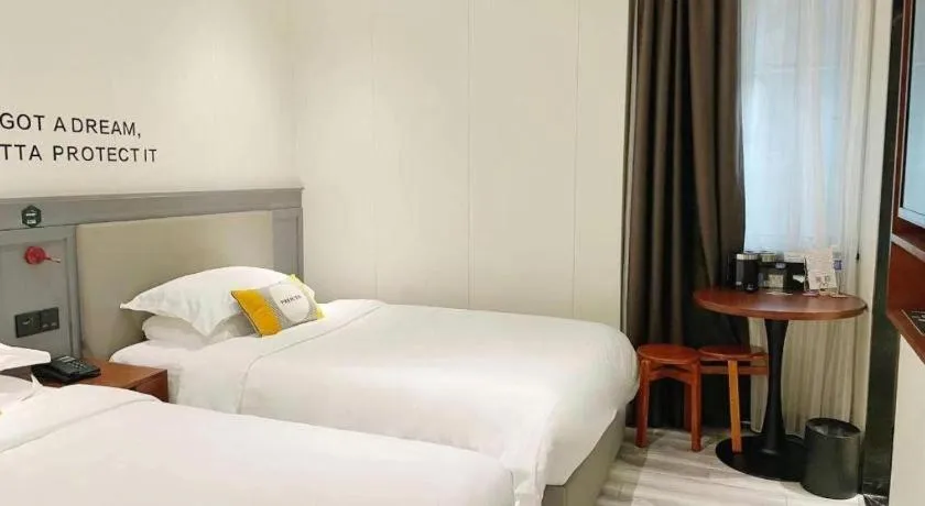 Bed in City Comfort Premier Hotel Guangzhou Tower Chigang Metro Station Pazhou Exhibition