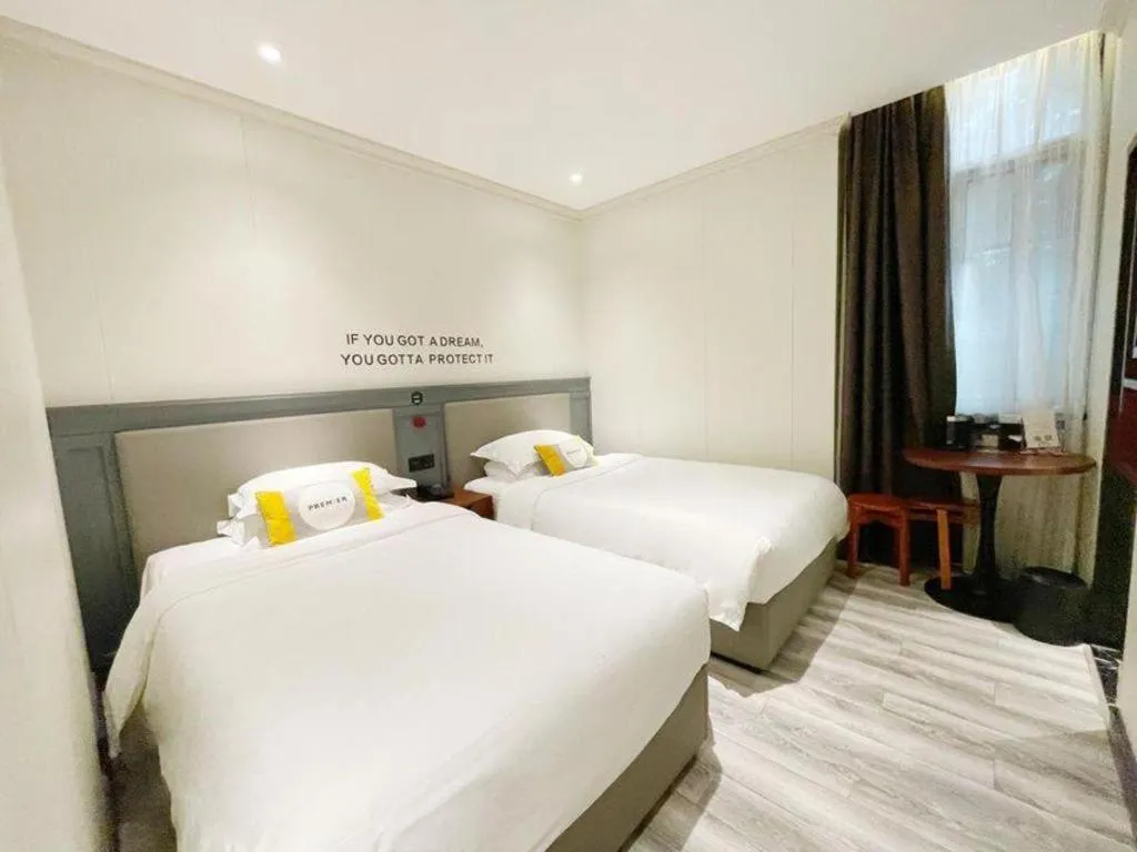 Bed in City Comfort Premier Hotel Guangzhou Tower Chigang Metro Station Pazhou Exhibition