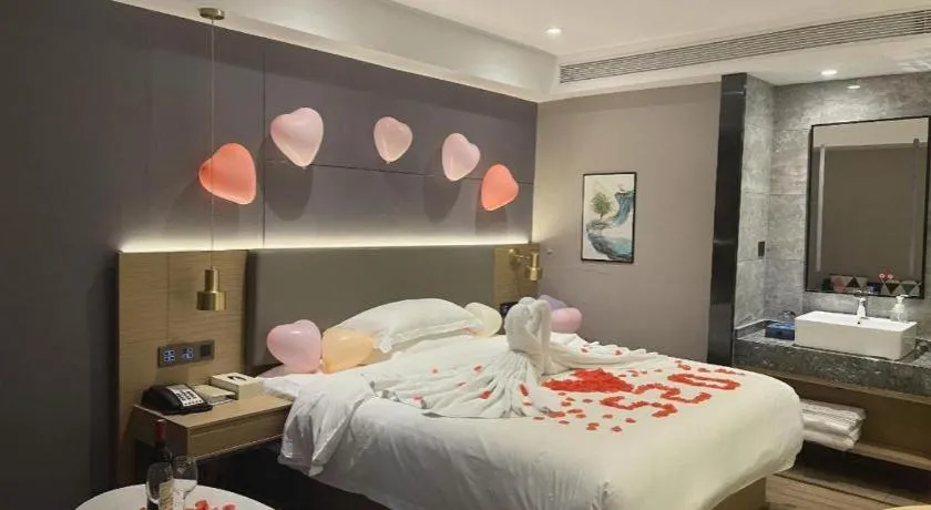 Bed in Echarm Hotel Guangzhou Gangding Huashi Metro Station