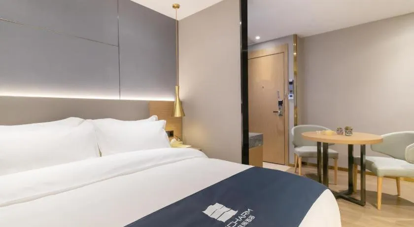 Bed in Echarm Hotel Guangzhou Gangding Huashi Metro Station