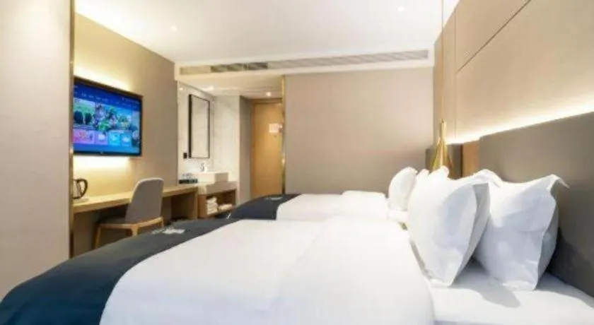 Bed in Echarm Hotel Guangzhou Gangding Huashi Metro Station