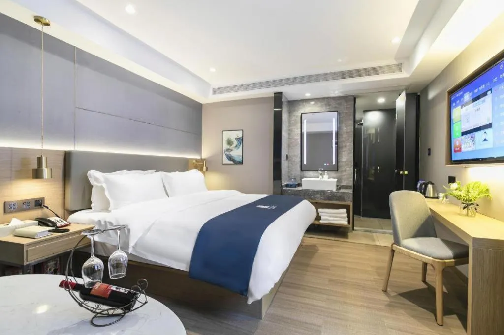 Bed in Echarm Hotel Guangzhou Gangding Huashi Metro Station