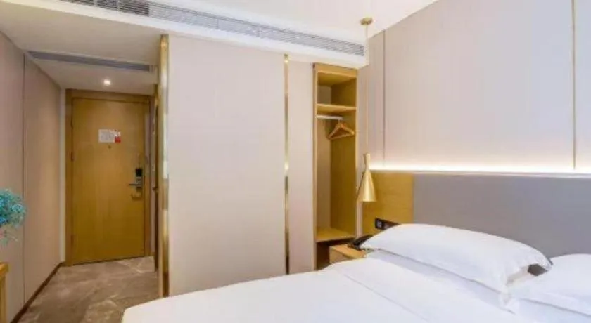 Bed in Echarm Hotel Guangzhou Gangding Huashi Metro Station