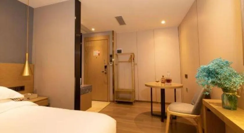 Bed in Echarm Hotel Guangzhou Gangding Huashi Metro Station