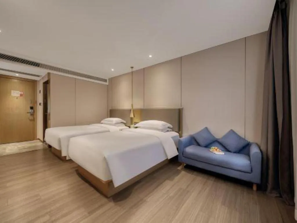 Bed in Echarm Hotel Guangzhou Gangding Huashi Metro Station