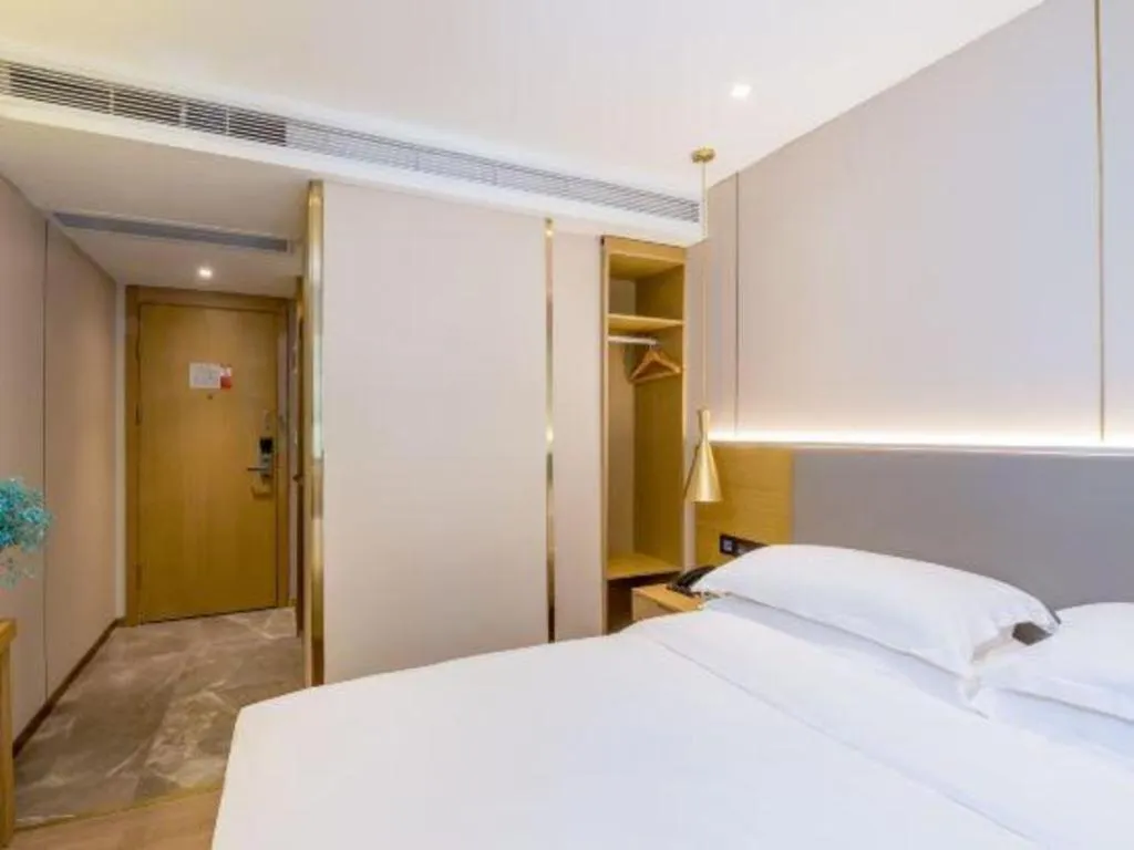 Bed in Echarm Hotel Guangzhou Gangding Huashi Metro Station