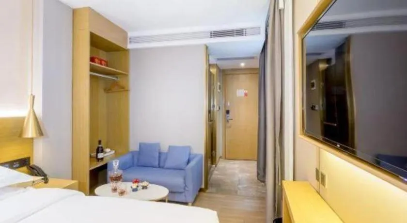 Bed in Echarm Hotel Guangzhou Gangding Huashi Metro Station