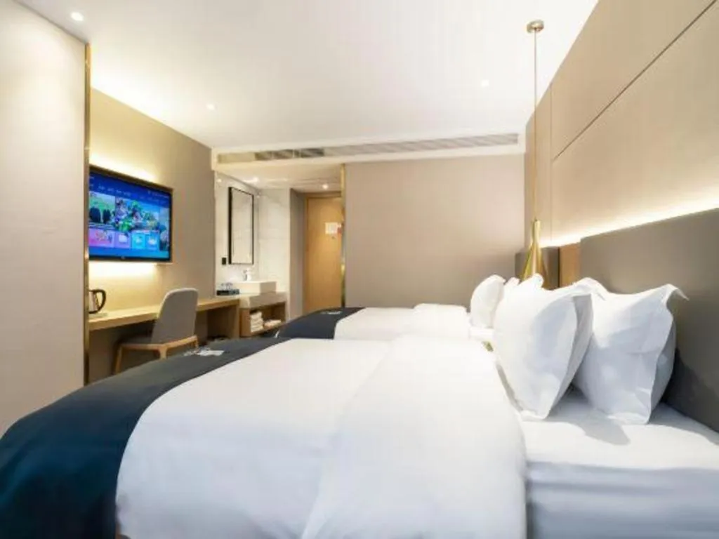 Bed in Echarm Hotel Guangzhou Gangding Huashi Metro Station