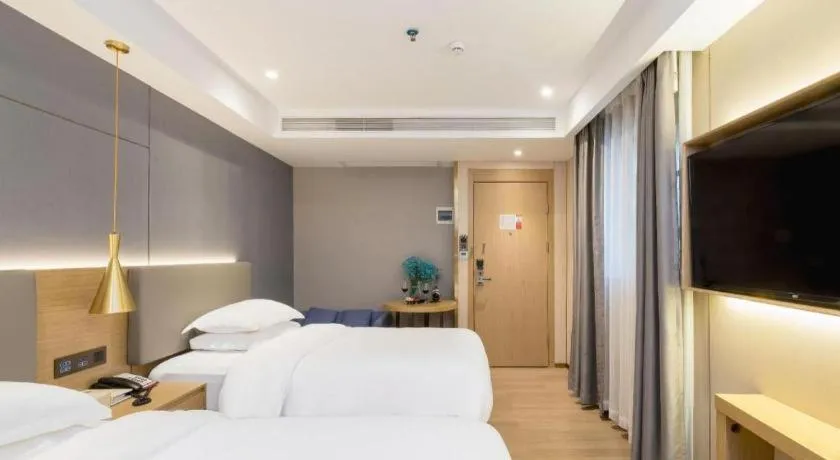 Bed in Echarm Hotel Guangzhou Gangding Huashi Metro Station