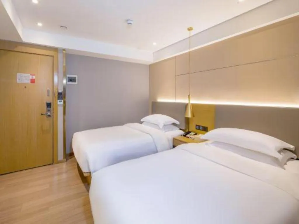 Bed in Echarm Hotel Guangzhou Gangding Huashi Metro Station