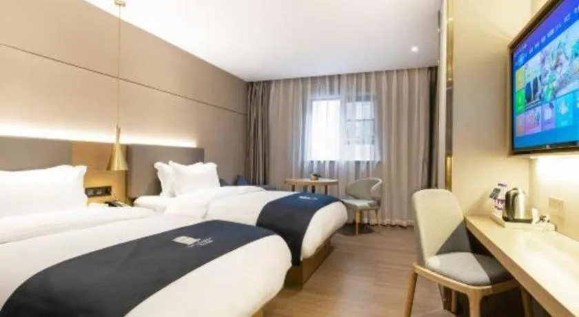 Bed in Echarm Hotel Guangzhou Gangding Huashi Metro Station