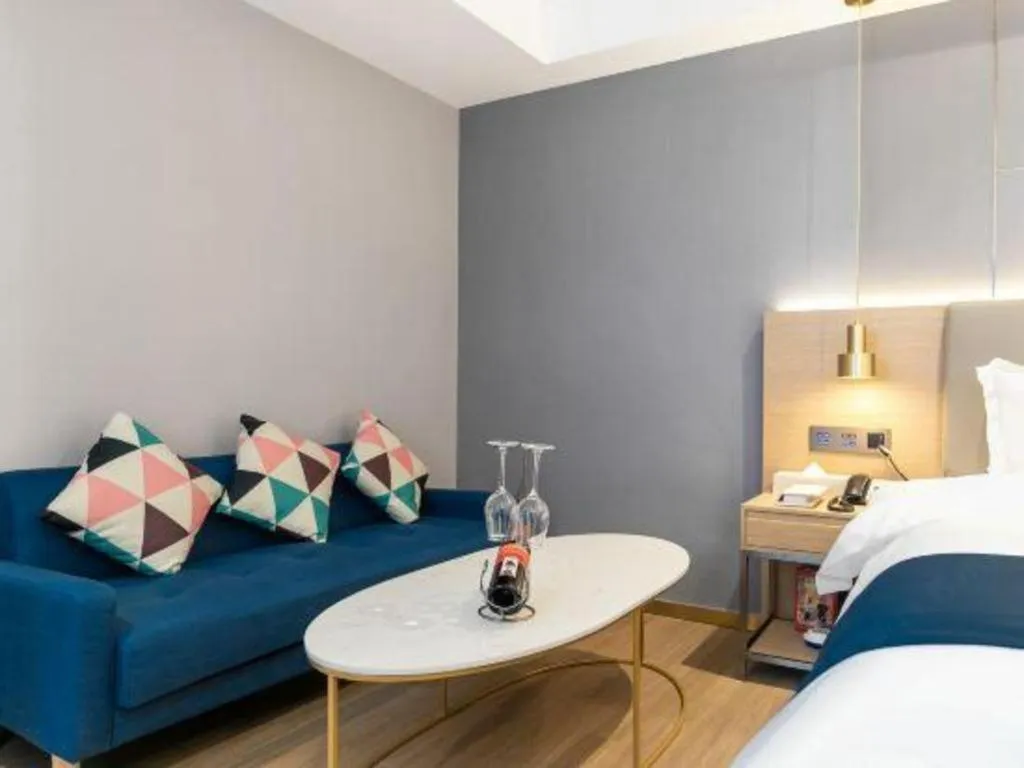 Bed in Echarm Hotel Guangzhou Gangding Huashi Metro Station