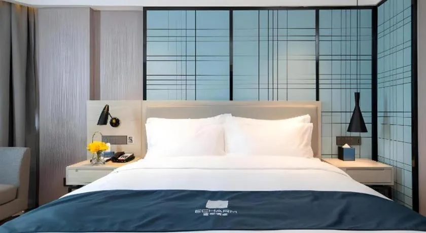 Bed in Echarm Hotel Shenzhen International Exhibition Center Fuyong