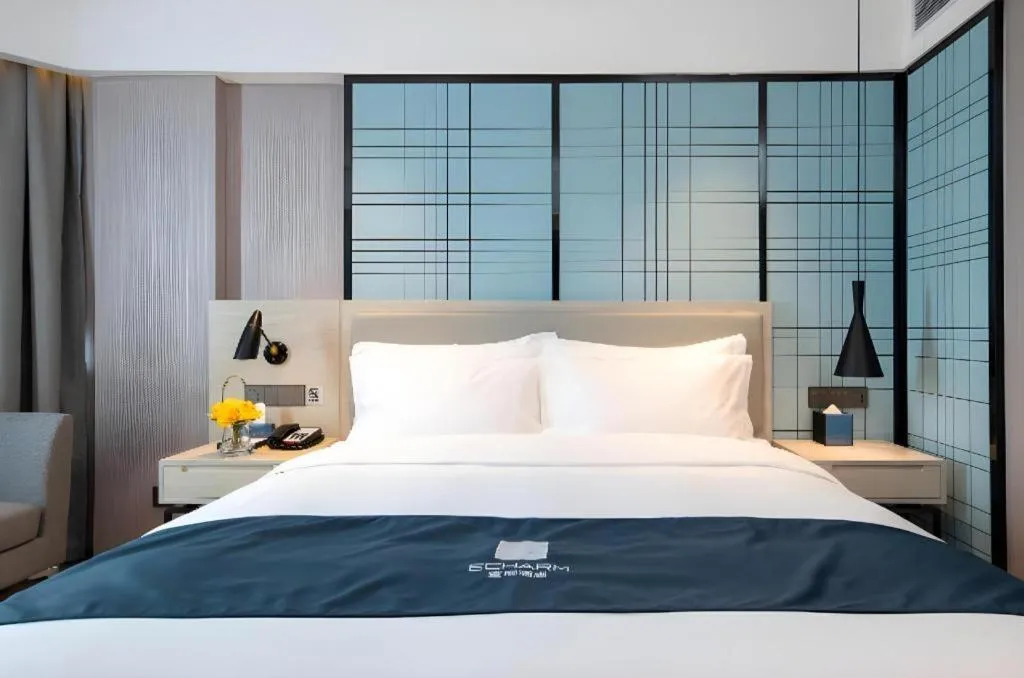 Bed in Echarm Hotel Shenzhen International Exhibition Center Fuyong