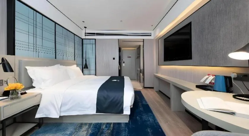 Bed in Echarm Hotel Shenzhen International Exhibition Center Fuyong