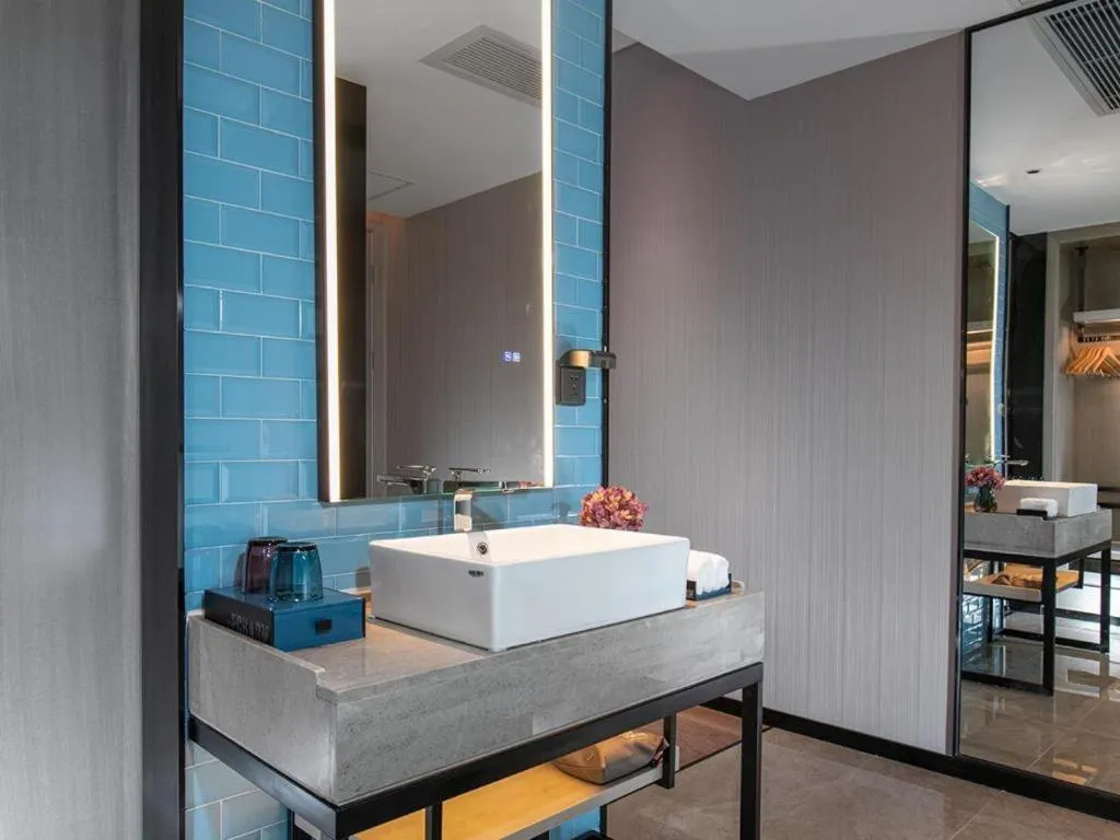 Bed in Echarm Hotel Shenzhen International Exhibition Center Fuyong