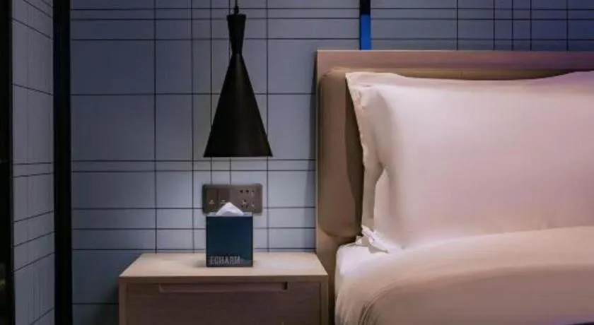 Bed in Echarm Hotel Shenzhen International Exhibition Center Fuyong