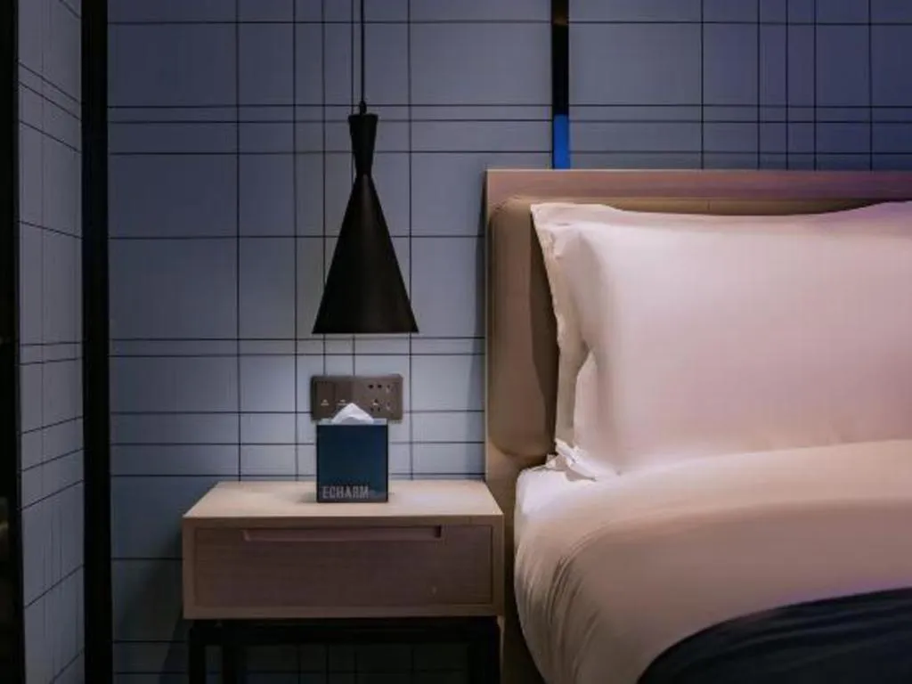 Bed in Echarm Hotel Shenzhen International Exhibition Center Fuyong