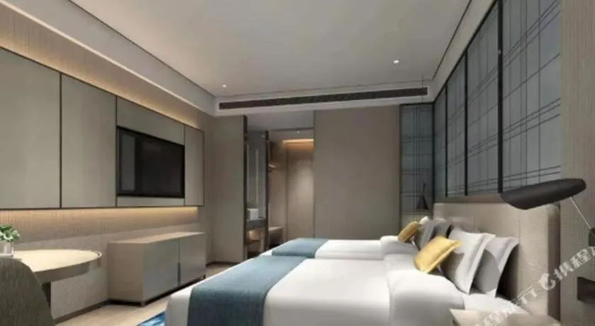 Bed in Echarm Hotel Shenzhen International Exhibition Center Fuyong