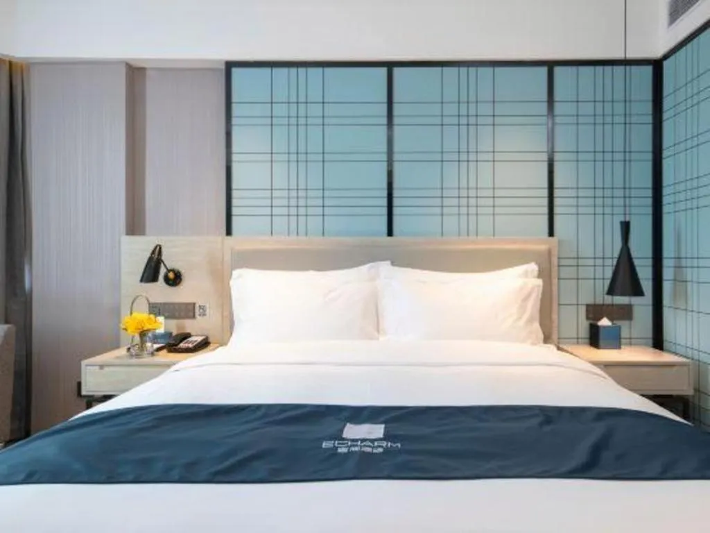Bed in Echarm Hotel Shenzhen International Exhibition Center Fuyong
